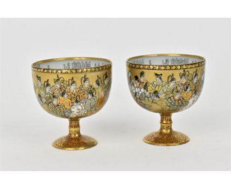 A pair of Meiji period Kutani sake cups, the insides with Waka classical poetry verses, the exteriors with hand painted illus