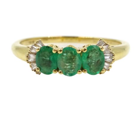 Iliana gold oval emerald and baguette diamond ring, stamped 18K Condition Report Approx 4.04gm, size V