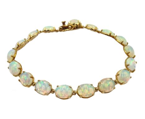 9ct oval opal link bracelet, stamped 375 Condition Report Length = 20cm, very good condition
