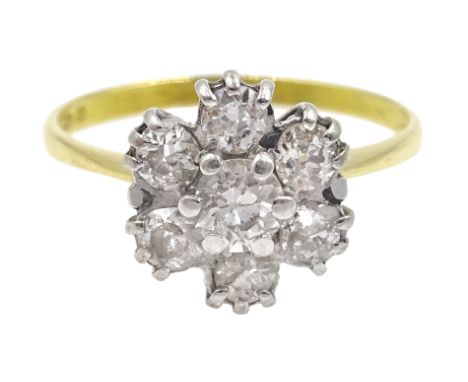 18ct gold seven stone diamond cluster ring, London 1978 Condition Report Approx 2.65gm, size N-O, head diameter = 10mm 