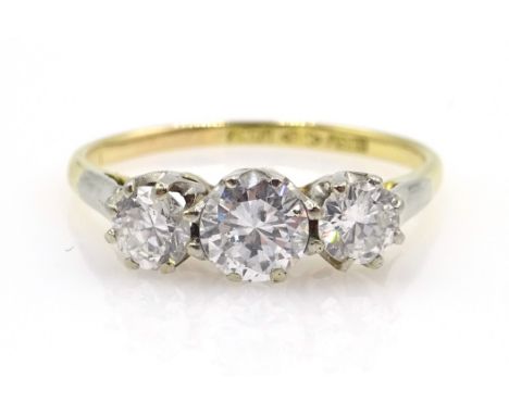 Gold three stone diamond ring stamped 18ct Plat, centre stone approx 0.44 carat, each side stone approx 0.23 carat Condition 