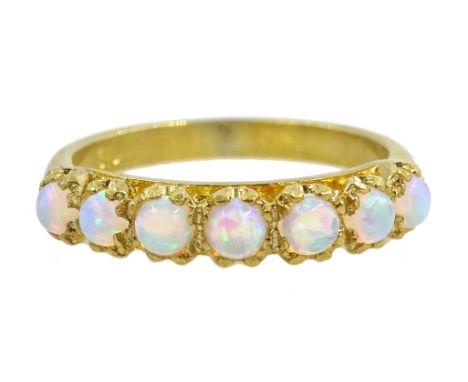 Silver-gilt seven stone opal ring, stamped Sil