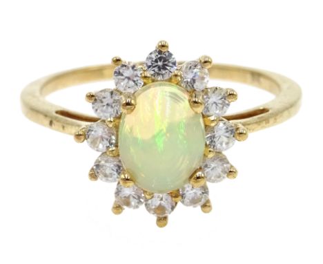 9ct gold oval opal and zircon cluster ring, hallmarked, opal 0.80 carat Condition Report Approx 2.92gm, size T, with certific