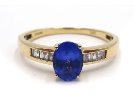 14ct gold oval tanzanite and baguette diamond ring, hallmarked Condition Report Approx 3.0gm, size V