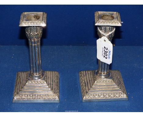 A pair silver plated Corinthian column candlesticks by William Hutton &amp; Son, 6" tall.