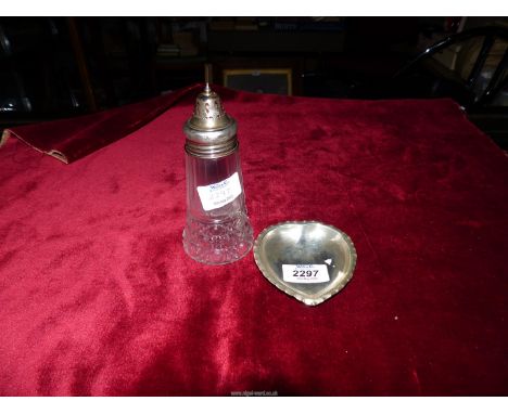 A Silver heart shaped trinket dish, Birmingham 1896 and a silver topped sugar sifter, hallmarks faded.