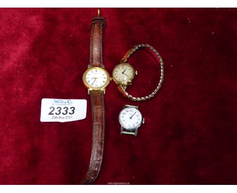 Three ladies watches including; gold backed Rotary, Accurist and Saga.  **