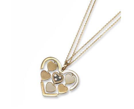 A Happy Amore diamond pendant by Chopard, designed as 18ct rose gold hearts with three 'floating' round brilliant cut diamond