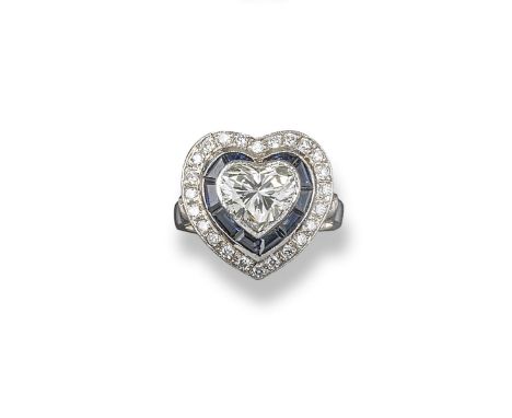 A heart-shaped diamond cluster ring, set with a central heart-shaped diamond which weighs approximately 1.90cts and is milleg