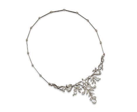 An Edwardian diamond and natural pearl set tiara converting to a necklace, of foliate form and set with five pearls and gradu