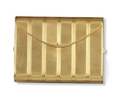 A gold powder compact, with lines of engine turned decoration within plain lines. Of envelope form and opening to reveal a po