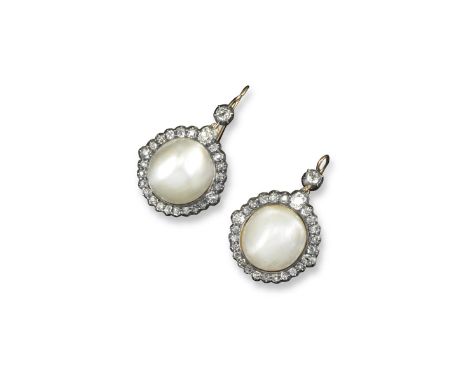 A pair of natural saltwater blister pearl and diamond earrings, the large blister pearls are set within a surround of cushion