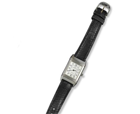 A lady's steel Reverso wristwatch, by Jaeger-LeCoultre. Manual winding. Signed silver dial with black Arabic numerals. Fluted