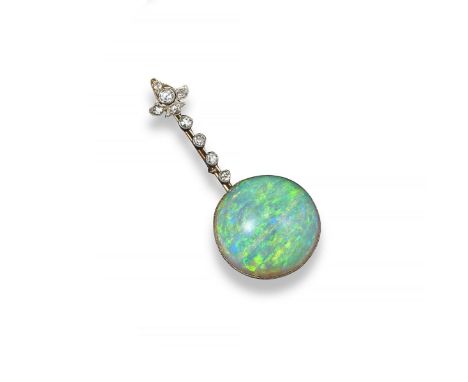 An early 20th century opal and diamond-set comet brooch, set with a large solid white opal cabochon and a line of millegrain-