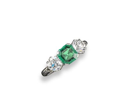 A Colombian emerald and diamon three stone ring, the square-shaped emerald is set with two old circular cut diamonds in plati