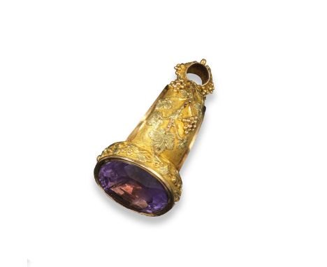 A Regency gold and amethyst mounted stirrup-style seal, with three-colour gold fruiting vine decoration overall. Blank matrix