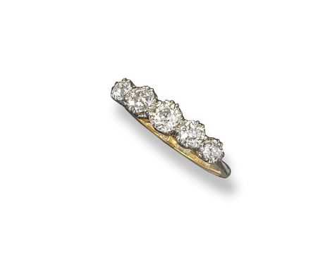 A diamond five stone ring, set with graduated old cushion-shaped diamonds in platinum and gold. Size R 1/2.