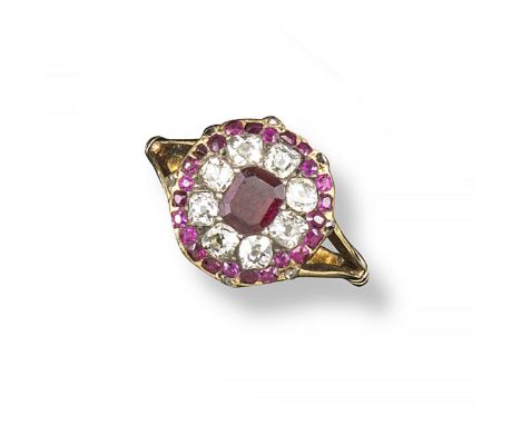 A 19th century ruby and diamond cluster ring, the emerald cut ruby is set within a surround of eight cushion-shaped diamonds 