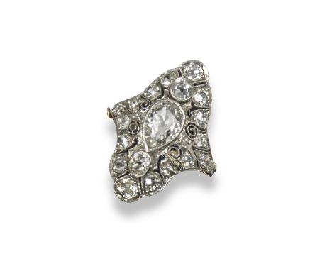 An early 20th century navette-shaped diamond cluster ring, set with a central pear-shaped diamond which weighs approximately 