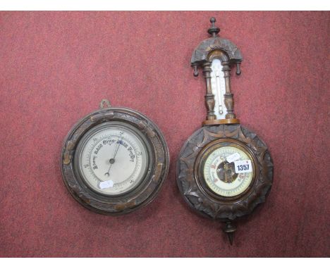 A Victorian Wall Barometer/Thermometer, 46cm tall overallplus a later circular example. (2)