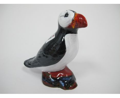 An Anita Harris Model of a Puffin, reactive glaze and enamel, gold signed, 14cm high