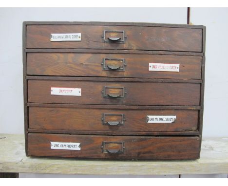 An Early XX Century Five Drawer Apothecary Cabinet, with five enamel product signs, 47.5cm wide.