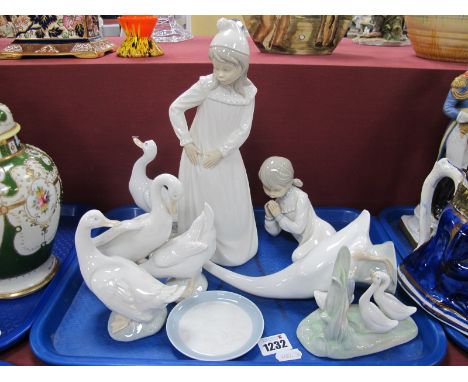 Nao Girl in Nightdress, 29cm high. Seated figure, six geese groups, Lladro pin tray:- One Tray.