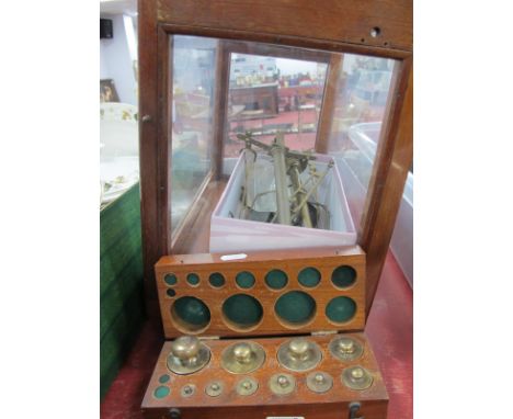 Laboratory Balance Scales, in mahogany glazed case, together with ten (from twelve) graduated weights in box.