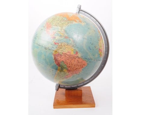 A vintage 20th century circa 1970s Rath Political globe. The world globe having chrome colour acrylic frameover a wooden base