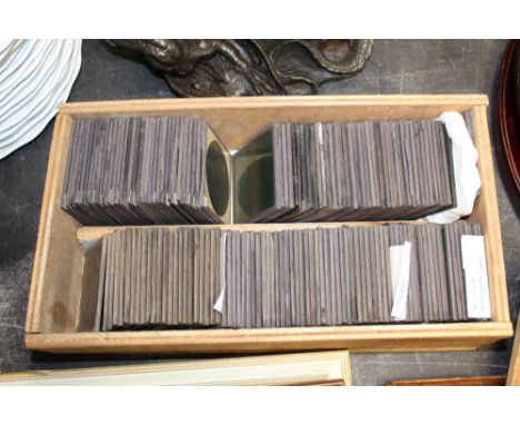 A pine case of lantern slides mainly Switzerland  