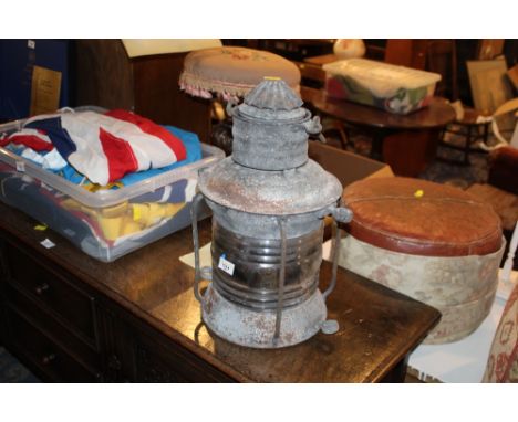 A Victorian galvanised metal clay glass ships lamp with ribbed central shade, 48cm high (shade cracked and metal corroded)