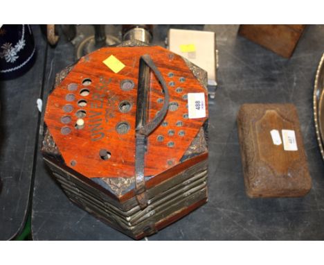 A German "Universe" concertina accordion, with metal mount (AF)