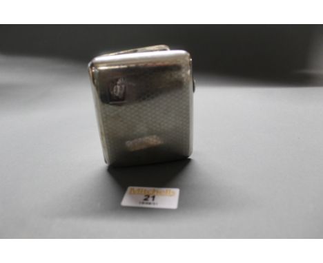 An early 20th century engine turned silver cigarette case, gross weight 89 grams