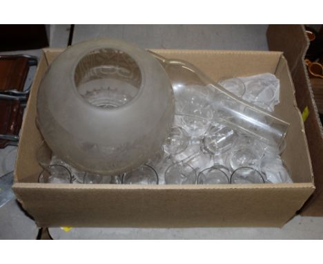 A box of various etched glasses to include global shade and glass oil lamp chimney 