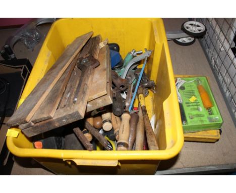 A plastic tub of hand tools to include chisels and other tools 