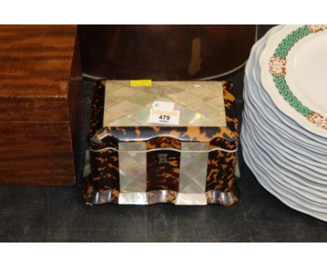 A 19th century mother of pearl and tortoiseshell veneered 2 compartment tea caddy 