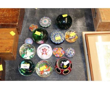 A quantity of glass paperweights to include caithness,  Chinese lamp work, Millefiori etc