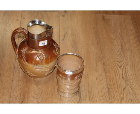 A white metal mounted 19th century stoneware hunting jug, in the manner of Doulton and sold together with 19th silver mounted