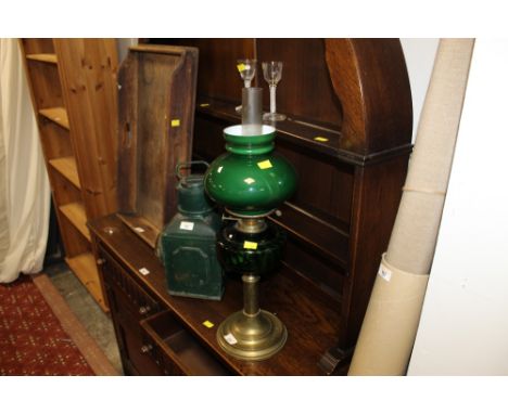 A 20th century brass and glass oil  lamp, with green glass reservoir 