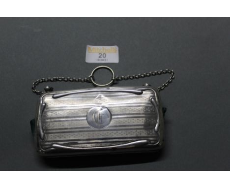 An Edwardian engine turned silver purse with Chester hallmarks, gross weight 98 grams