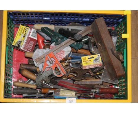 A box of miscellaneous hand tools to include moulding plane, rasps etc