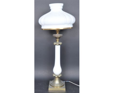 Large early 20th century brass and glass table electrolier lamp. Brass base with glass baluster column with brass acanthus le