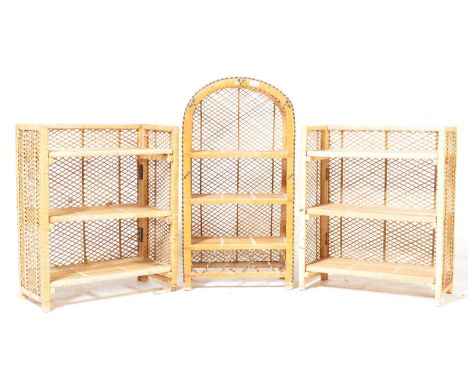 A pair of vintage retro 20th century wicker folding shelves/ bookcases of a rectangular form with geometrical decoration toge