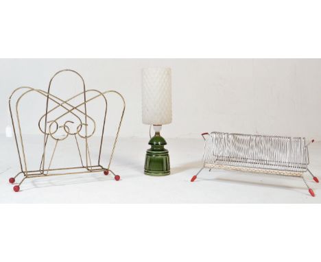 A collection of retro vintage mid 20th century items comprising of an Atomic / Sputnik magazine rack, a vinyl rack holding 50