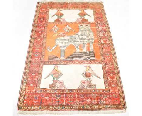 A 20th century Persiah Gabbeh / Qashqai Rug - SW Iran tribal animal floor carpet rug. Decorated with scene of leopard and bir