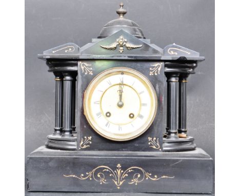 A Victorian 19th century slate mantel clock. The clock with column sides, gilt detailed decoration. Central dial with roman n