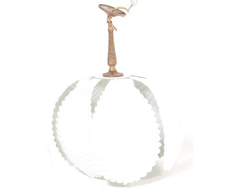 A mid century circa. 1950s Hollywood Regency style ceiling light shade constructed of white painted metal in the form of palm