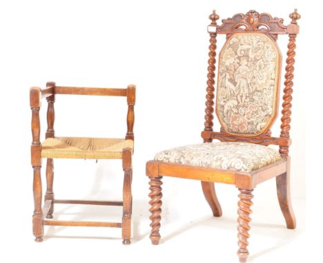 A Victorian 19thc century hall chair having a top rail carved with palmette motifs over barley twist back posts and being uph
