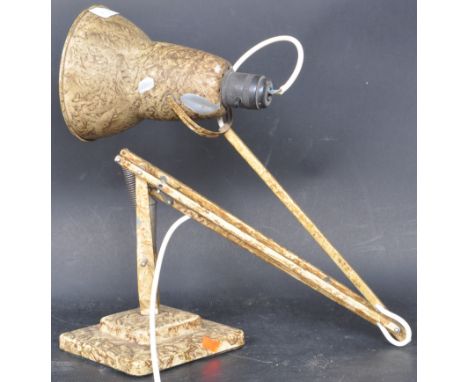 A 20th Century circa 1940's Industrial pre-war Herbert Terry anglepoise lamp, raised on a cast metal two step base with penda