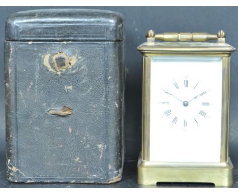 An&nbsp;early 20th Century French brass cased carriage clock of typical form having a white enamel face with black Roman nume